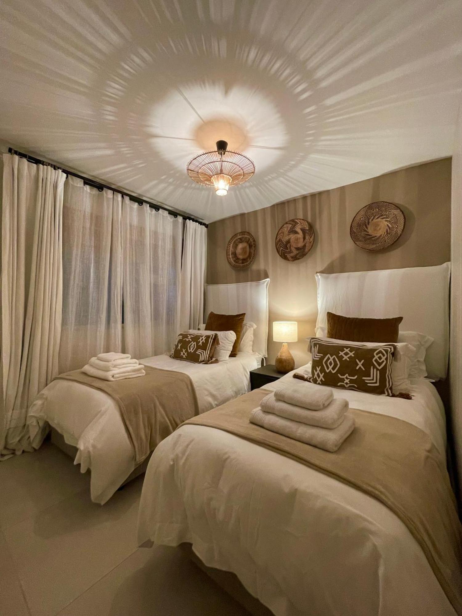 Abode Africa Apartment โบลแบร์กสตรานด์ ภายนอก รูปภาพ